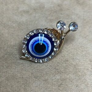 Small Evil Eye Snail Lapel Pin